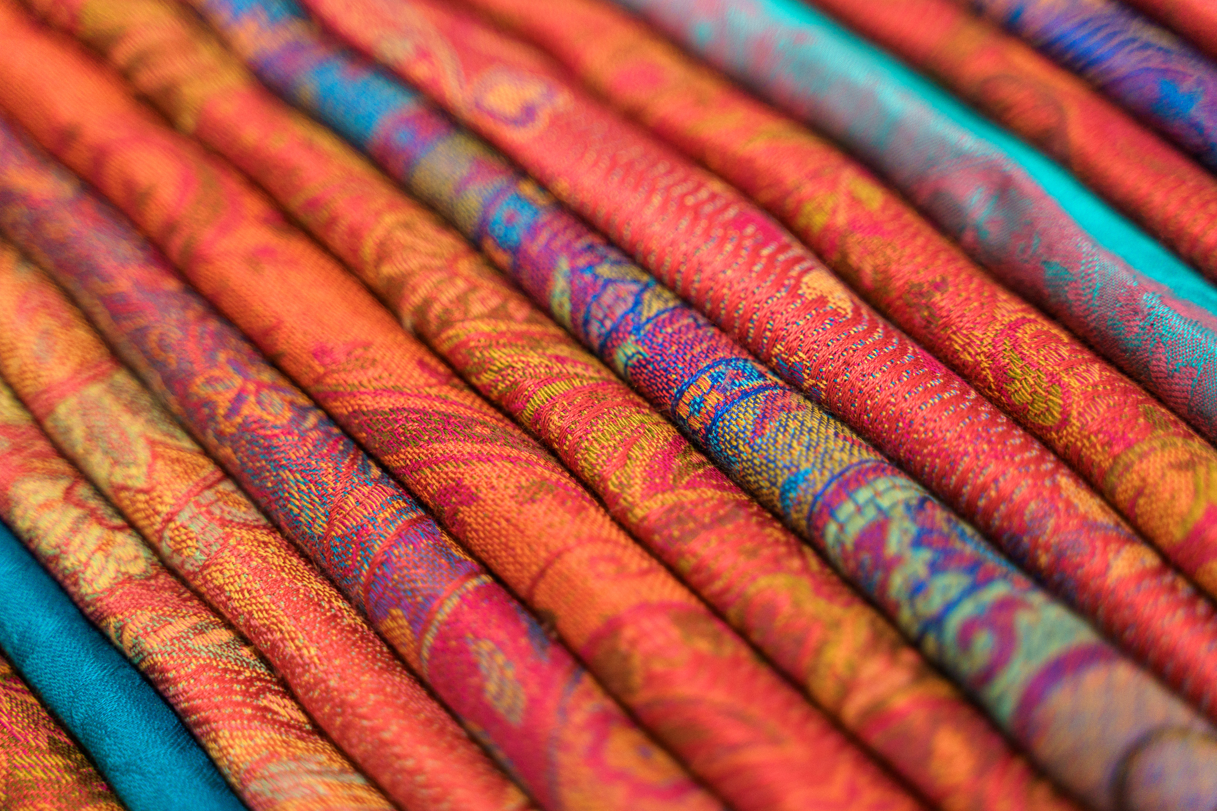 Traditional Indian fabric store. Colorful traditional indian hindi textile fabric wrap scarfs
